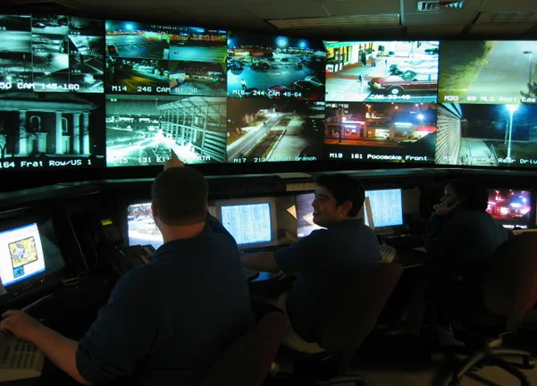 Security operations monitoring room with multiple screens
